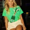 Queen Of Sparkles Poppin' Shamrock Champagne Tee NEW