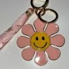 Wanderlust By Abby Smiley Face Flower Key Chain