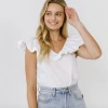 Wanderlust By Abby Ruffle Neckline Top