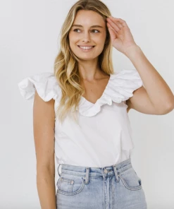 Wanderlust By Abby Ruffle Neckline Top